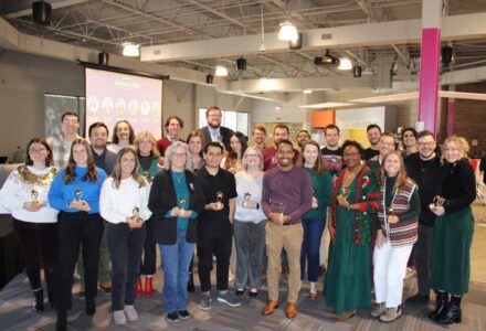 Employee group photo at a holiday party